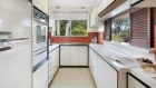 The two-bedroom, one-bathroom apartment with car park at 12/20-24 The Parade in inner-western Sydney’s Russell Lea sold at auction for $1,063,000.