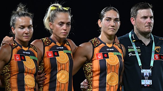 Daniel Webster (right), alongside some of his players.