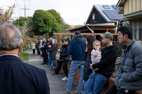 Prospective home buyers at an auction in Brunswick on Saturday.