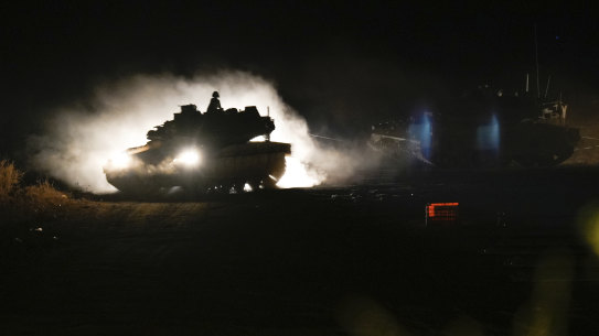 An Israeli tank manoeuvres in northern Israel near the Israel-Lebanon border.