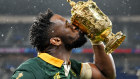 South Africa captain Siya Kolisi kisses the Webb Ellis Cup after leading his team to their second consecutive Rugby World Cup Final victory. 