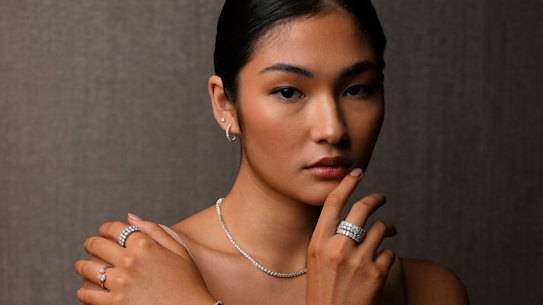 Model Kristena Seedwell wears a selection of Michael Hill’s new range of lab-grown diamond jewellery at the company’s head office in Brisbane.