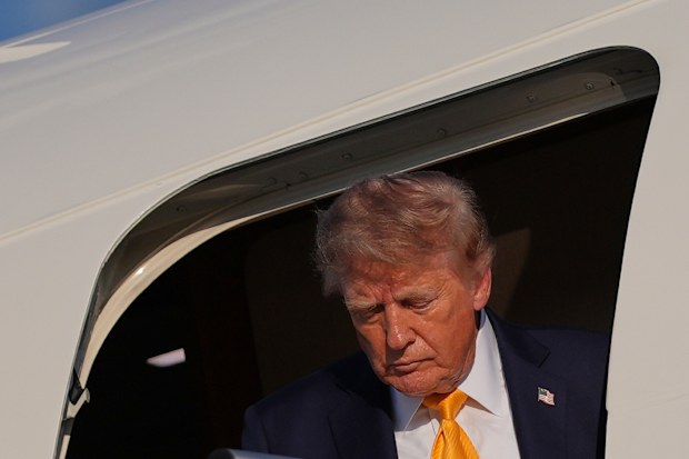 President Donald Trump arrives on Air Force One at Morristown Airport.