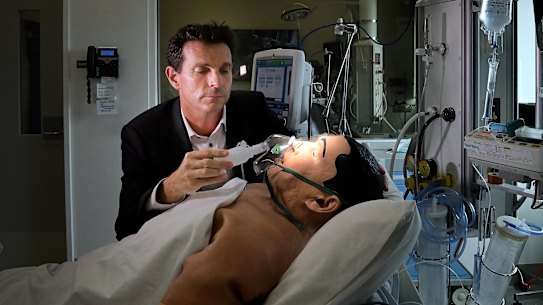 ANU Professor Frank van Haren simulates administering inhaled heparin.