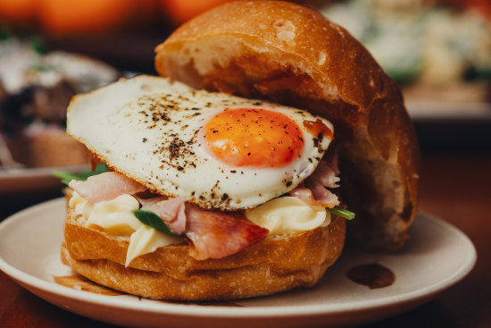 Bacon and egg roll with spinach.