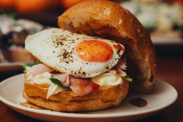 Bacon and egg roll with spinach.