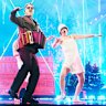 Swedish group Kaj perform Bara Bada Bastu at the 2025 Eurovision Song Contest.