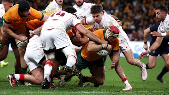 Fraser McReight crashes over for a try against Georgia.