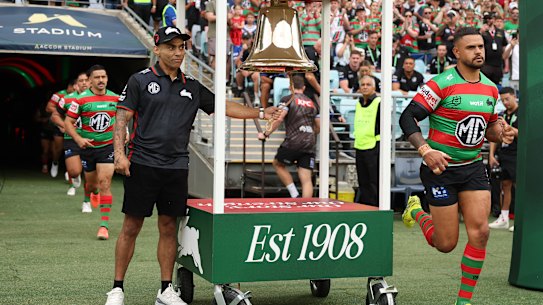 Nathan Merritt rings South Sydney's Heritage Bell as the Rabbis take to the field on Friday.