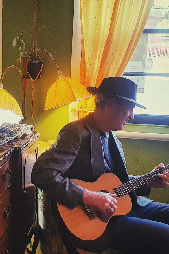 Oakenville Farm Store co-owner Jeff Gibson on guitar.