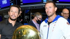 F45 founder Adam Gilchrist, right, and major shareholder Mark Wahlberg on the floor of the New York Stock Exchange for the company’s IPO in July 2021.