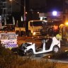 One man dead, another critical after car runs red light in Brisbane's north