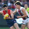 The AFL ordered umpires to tighten holding-the-ball calls, see the video of how the rule will now work