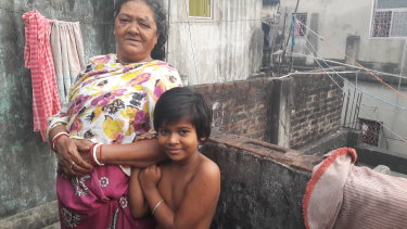 Brothel 'madam' Renu Singh and her granddaughter in the red light area of Sonagachi, Calcutta.
