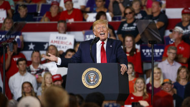 US President Donald Trump speaks at a campaign rally at Williams Arena in Greenville, NC.