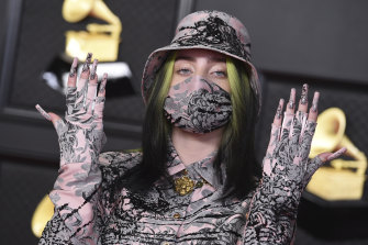 Billie Eilish arrives at the 63rd annual Grammy Awards at the Los Angeles Convention Center on Sunday, March 14, 2021. 