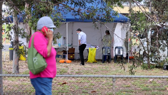 People queuing at the COVID-19 Testing site at Parafield Airport.