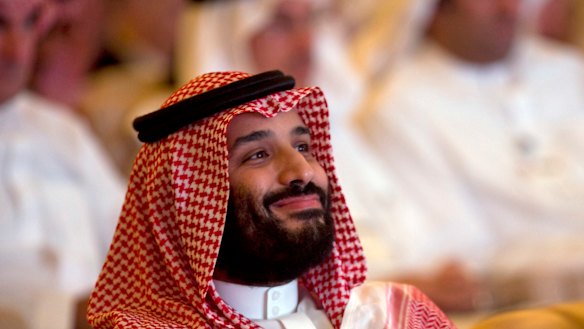 Saudi Crown Prince, Mohammed bin Salman, smiles as he attends the Future Investment Initiative conference.
