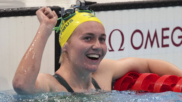 Ariarne Titmus celebrates after mowing down Katie Ledecky to win gold in the 400m freestyle.