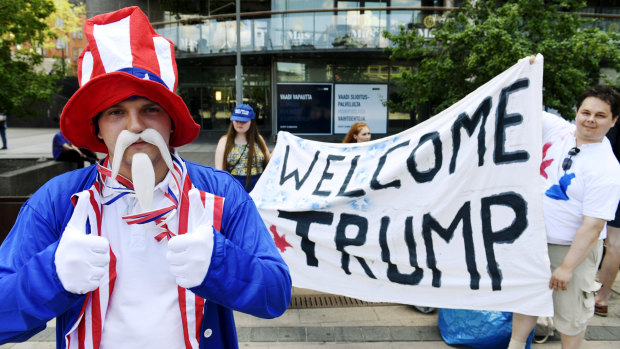 Teppo Marttila, dressed as Uncle Sam, participates in the demonstration by the True Finns youth members in support of Donald Trump in Helsinki on Sunday.