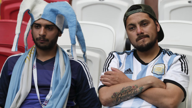 A bitter end: Argentina fans after the loss to France.