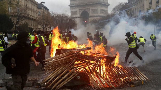 Demonstrators near the Arc de Triomphe on Saturday.
