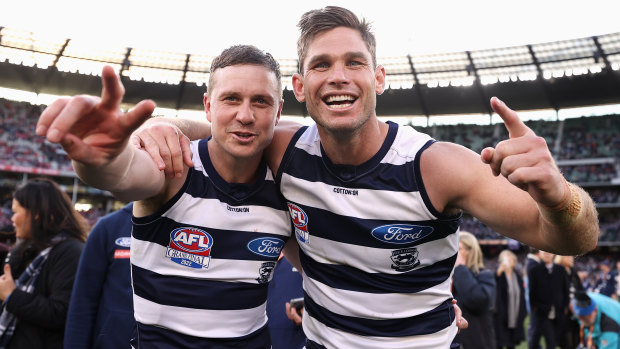 Mitch Duncan celebrates the moment with Tom Hawkins.