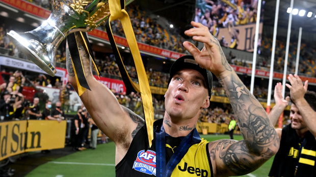 Richmond’s Dustin Martin with the 2020 AFL premiership cup at the Gabba.