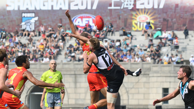 The AFL predicts a larger crowd to Saturday's Suns-Power game in Shanghai  than last year.