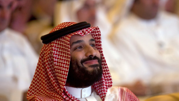 Saudi Crown Prince, Mohammed bin Salman, smiles as he attends the Future Investment Initiative conference.