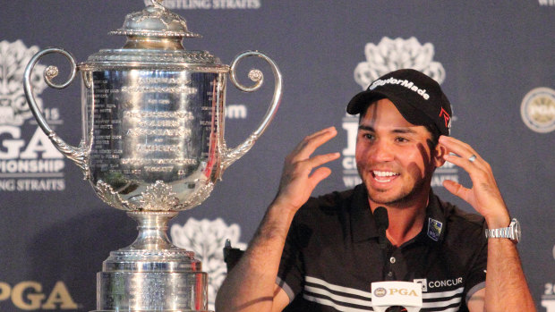 Jason Day celebrates his first major championship, the US PGA, in 2015.