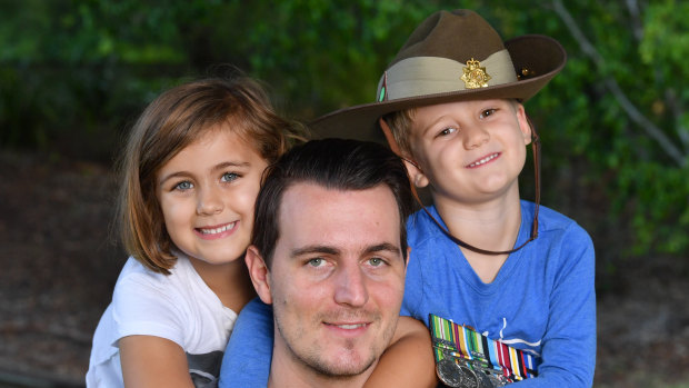 Former Australian Army medic James DeAngelis with his children Ava (left), 6, and Harry, 4 at Eatons Hill in Brisbane. Mr DeAngelis spent 11 years in the Army and served in East Timor, Bougainville, Afghanistan and Iraq.
