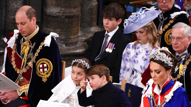 Deep in conversation, Prince Louis and Princess Charlotte.