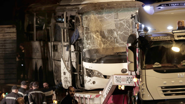 The tourist bus after a roadside bomb near the Giza pyramids. 