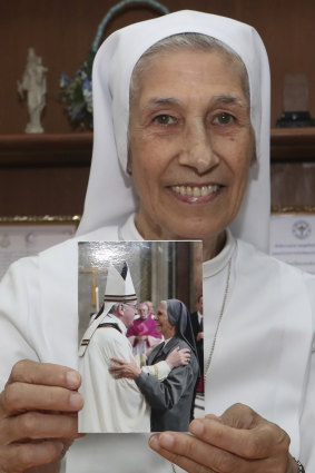 St Mary's School vice-principal Sister Ana Rosa Sivori shows a picture taken with Pope Francis - she shares a great-grandfather with Jorge Mario Bergoglio, who, six years ago, became Pope Francis. 