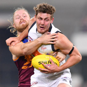 Harry Perryman tries to peel away from Daniel Rich during the Giants' semi-final win over the Brisbane Lions.