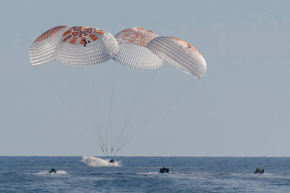 A SpaceX capsule splashes down off the coast of Florida with NASA astronauts Suni Williams, Butch Wilmore, Nick Hague, and Russian cosmonaut Alexander Gorbunov.