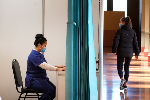 Nursing staff at a Melbourne vaccination hub.