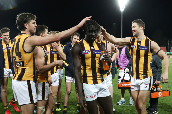 Hawthorn's Changkuoth Jiath celebrates victory in round 21.