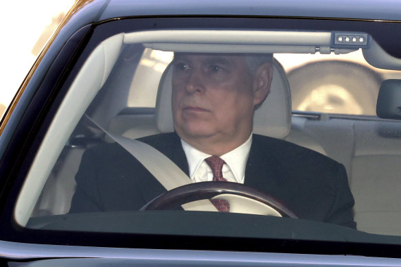 Prince Andrew drives himself to Buckingham Palace for the royal family's traditional pre-Christmas lunch.