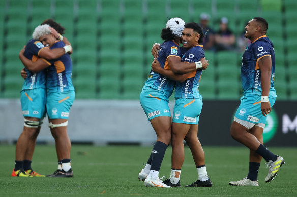 Moana players celebrate their win over the Drua.