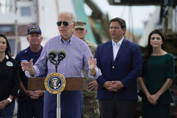 Getting along famously: US President Joe Biden speaks after touring an area impacted by Hurricane Ian in Fort Myers Beach.