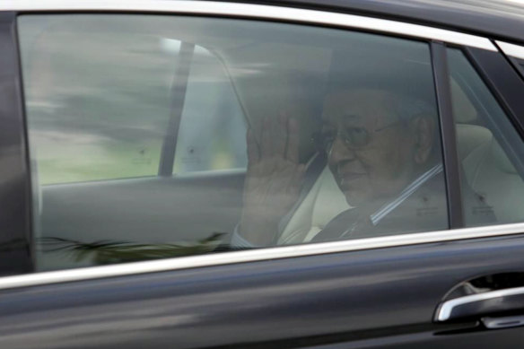Prime Minister Mahathir Mohamad leaves after meeting with King Sultan Abdullah Sultan Ahmad Shah at the National Palace in Kuala Lumpur on Monday.