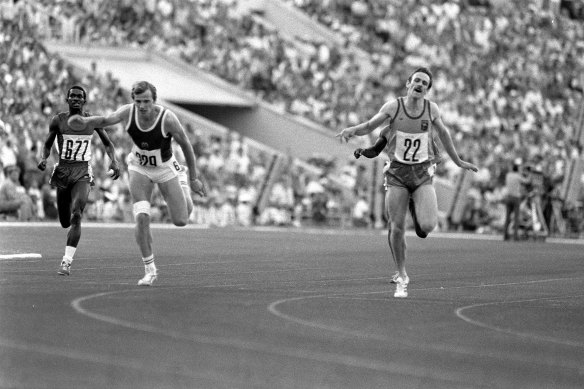 Rick Mitchell, right, pictured on 27 July, 1980 on his way to a silver medal in the 400m final. 