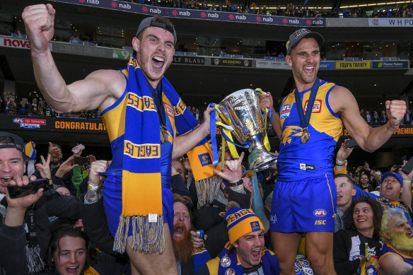 Luke Shuey (left) and Dom Sheed with the premiership cup in 2018.