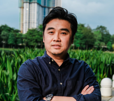 Eric Chan had a well-paying job writing code for satellites and robots before he started a company 15 years ago selling durian. He is now a millionaire.