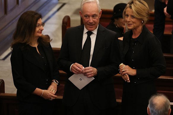 Former premiers Morris Iemma and Kristina Keneally (right) at the funeral.