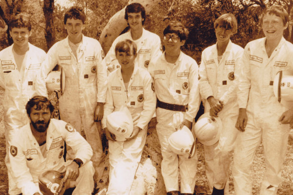Sixteen-year-old Shane Fitzsimmons in 1985 (front, centre, holding hat at waist level) with his dad, George (bottom left), and their Duffys Forest Rural Fire Brigade crew. George was killed with three other firefighters during a hazard-reduction burn in Ku-ring-gai Chase National Park in 2000. 