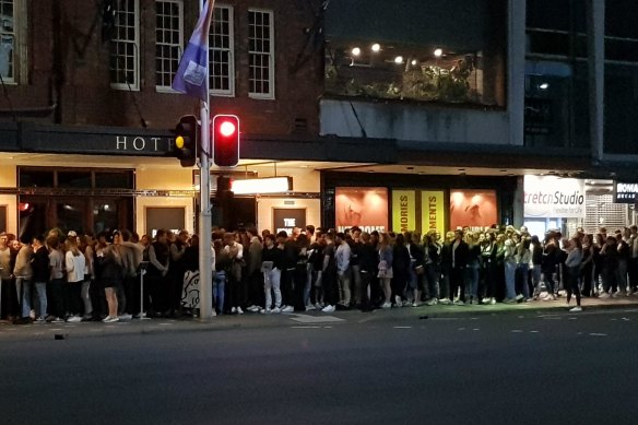 A queue of people outside The Golden Sheaf hotel in Double Bay in July 2020.