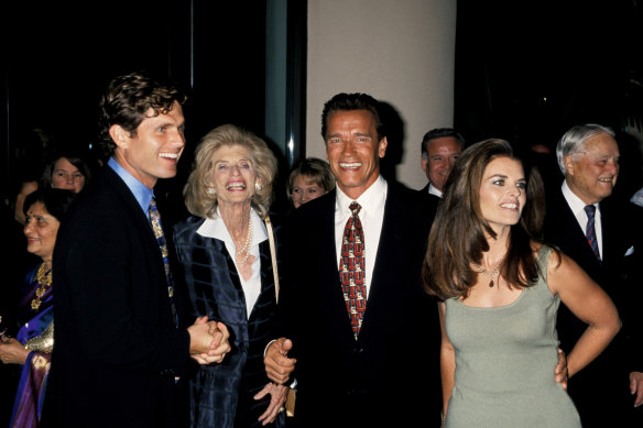 In 1998 with then-wife Maria Shriver
(right), her brother Bobby Shriver and her mum Eunice Kennedy Shriver.